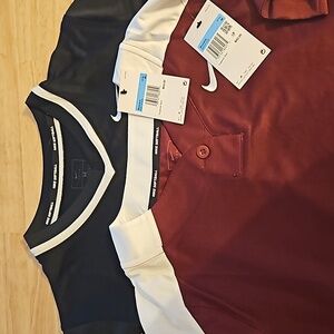 Two brand new Nike womens medium softball jerseys